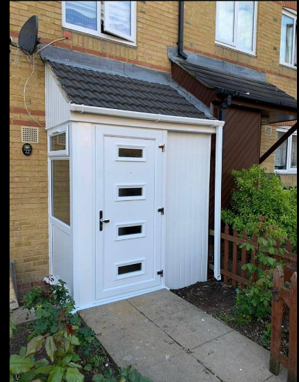 White uPVC porch with tiled pitched roof